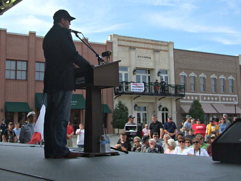 photo of mayor giving speech to the crowd